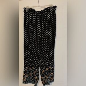 Brand new with tags, black & white pok-a-dot with floral pattern on bottom.